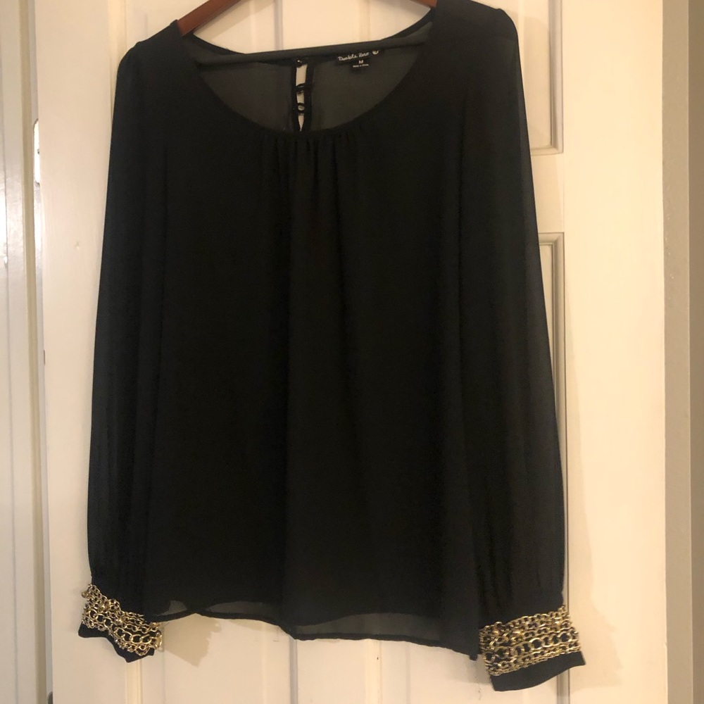 Dressy black top with gold cuffs